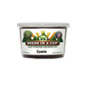 Cumin seeds in a cup with a label on a white background